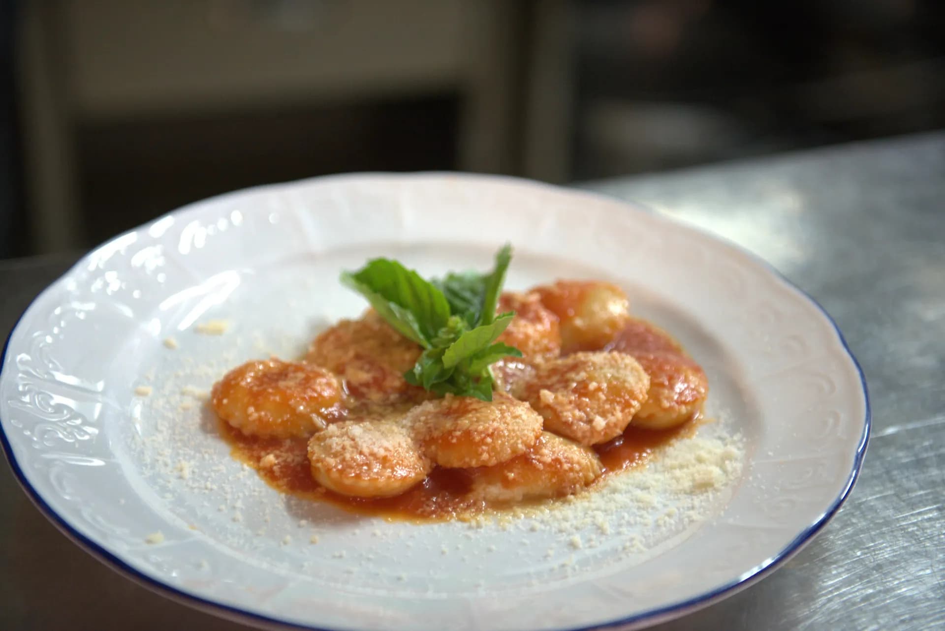 plate of fresh pasta in tomato sauce at a restaruant in Capri