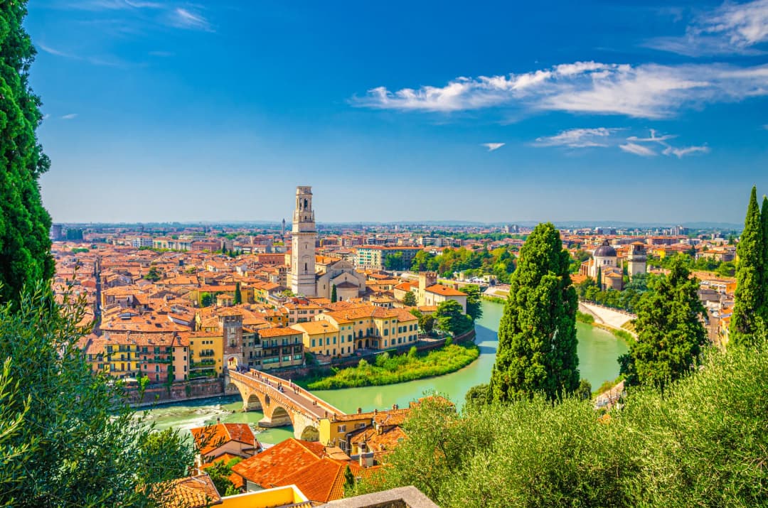 Aerial view of the Adige River running through the historic city center of Verona 