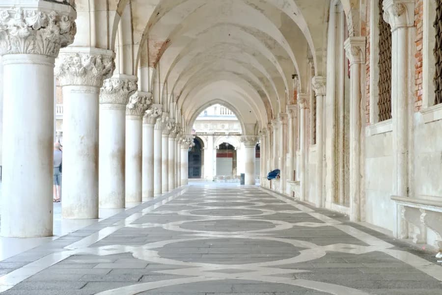 An arched gallery at Doge's Palace in Venice, Italy