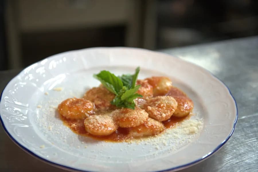 plate of fresh pasta in tomato sauce at a restaruant in Capri