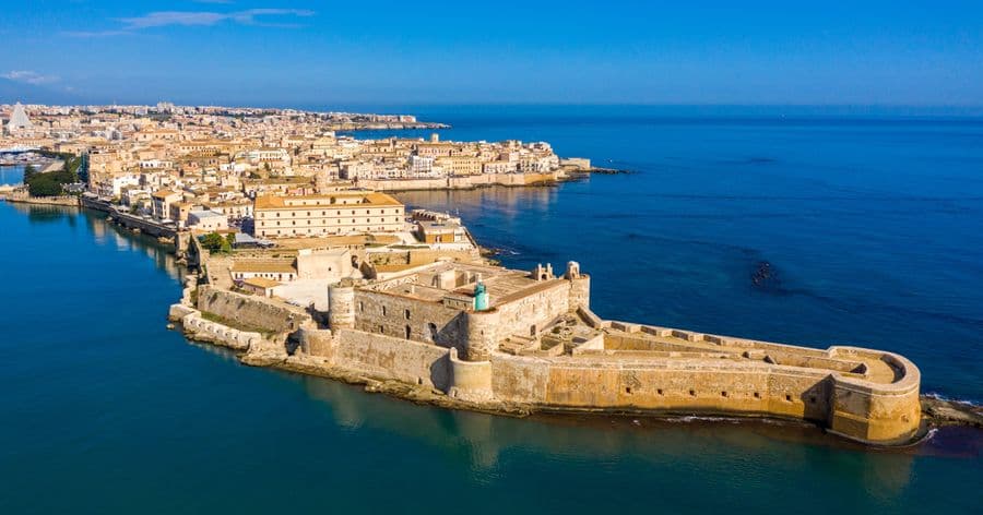 A Journey Through Ancient Syracuse: Archeology, Culture & Coastal Charm