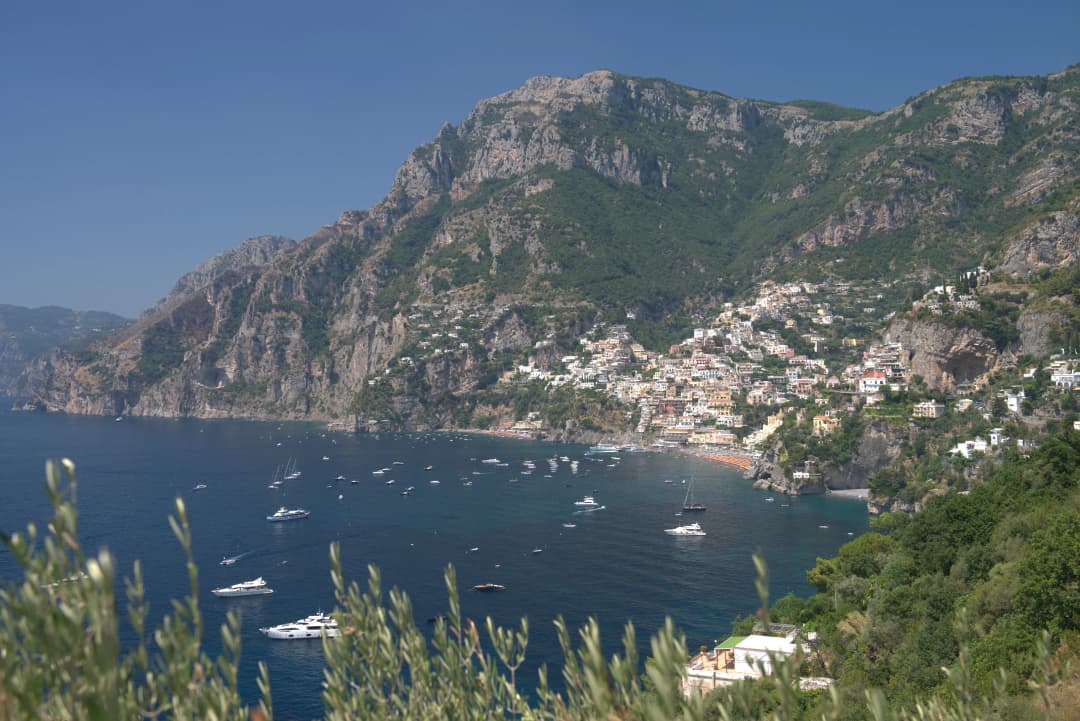 a marina with cliffs in the background on the Amalfi Coast