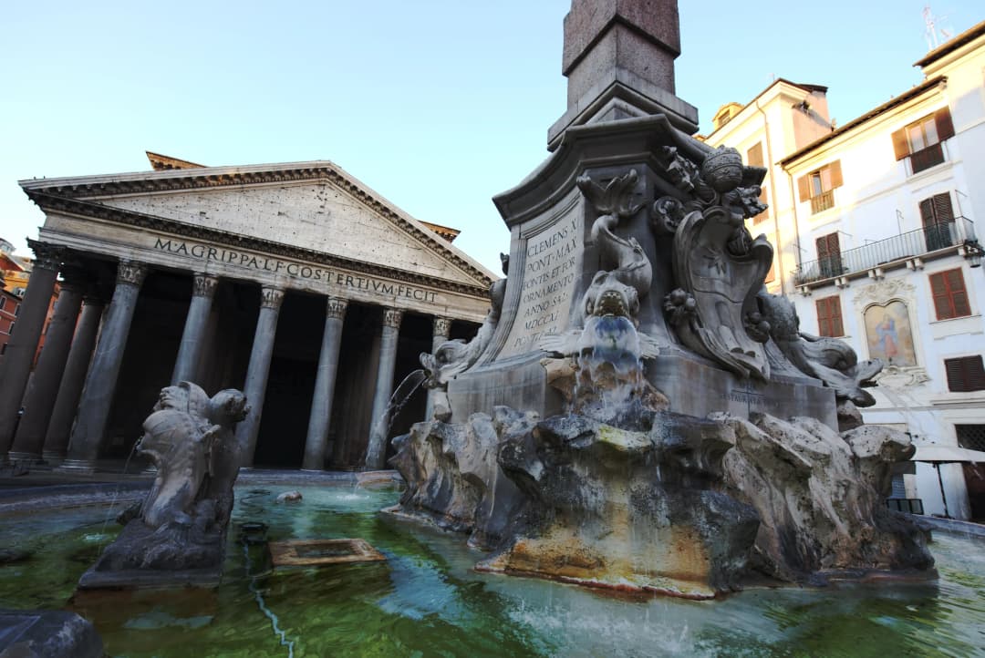 close up of the Pantheon Fountain with the Pantheon in the background